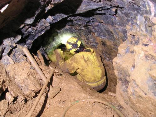 Jirka na čelbě ve 2. sifonu, jeskyně Okrouhlík